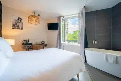 Un ou plusieurs lits dans un hébergement de l'établissement La Finca Hôtel & Spa