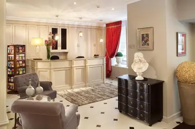 Coin salon dans l'établissement Hôtel des Comédies