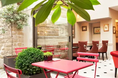 Coin salon dans l'établissement Hôtel des Comédies