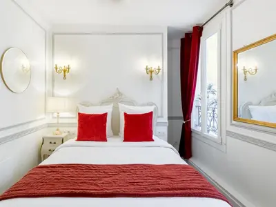 Un ou plusieurs lits dans un hébergement de l'établissement Merveil - Luxury Suite - Louvre - Aboukir IV