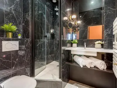 Salle de bains dans l'établissement Merveil - Luxury Suite - Marais - Saint Denis I
