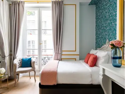 Un ou plusieurs lits dans un hébergement de l'établissement Merveil - Luxury Suite - Louvre - Aboukir III