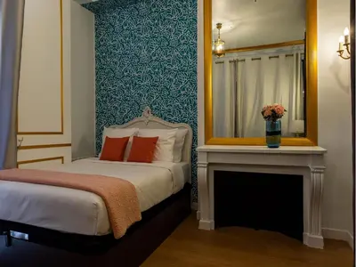 Un ou plusieurs lits dans un hébergement de l'établissement Merveil - Luxury Suite - Louvre - Aboukir III