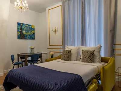 Un ou plusieurs lits dans un hébergement de l'établissement Merveil - Luxury Suite - Louvre - Aboukir III