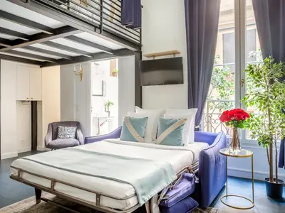 Un ou plusieurs lits dans un hébergement de l'établissement Merveil - Luxury Suite - Louvre - Aboukir II