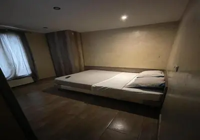 Un ou plusieurs lits dans un hébergement de l'établissement LPL Paris Hotel