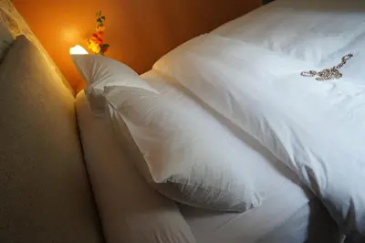 Un ou plusieurs lits dans un hébergement de l'établissement Hotel Danemark