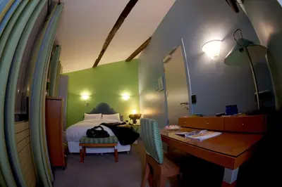 Un ou plusieurs lits dans un hébergement de l'établissement Hotel Danemark