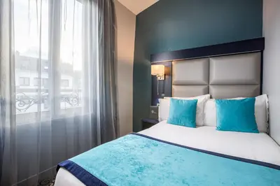 Un ou plusieurs lits dans un hébergement de l'établissement Prince Albert Montmartre