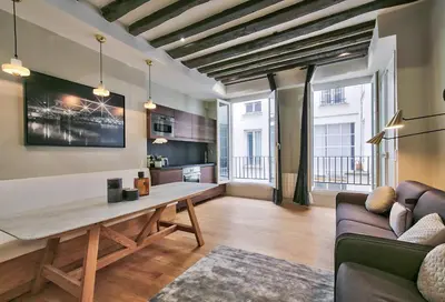 Coin salon dans l'établissement 70 - Authentic Parisian Flat