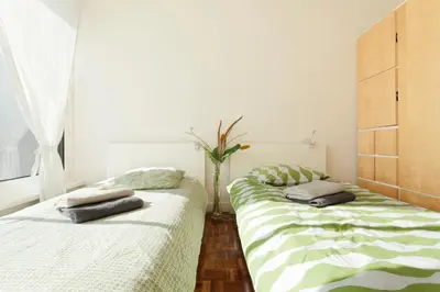 Un ou plusieurs lits dans un hébergement de l'établissement Appartement le Méridien