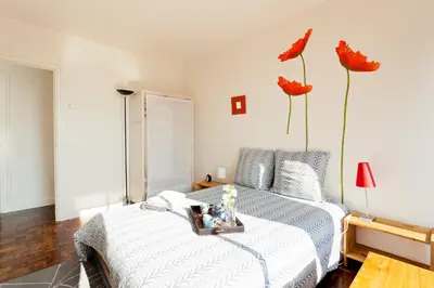 Un ou plusieurs lits dans un hébergement de l'établissement Appartement le Méridien
