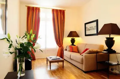 Coin salon dans l'établissement Appartements Caumartin 64