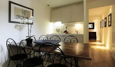 Cuisine ou kitchenette dans l'établissement Appartements Caumartin 64