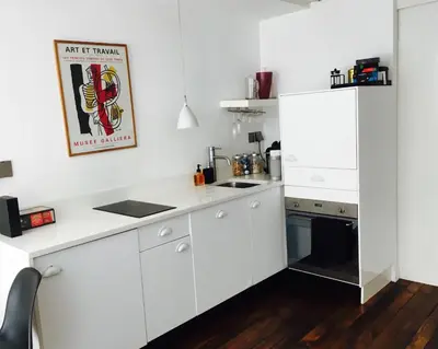 Cuisine ou kitchenette dans l'établissement Chez Vous ST HONORÉ