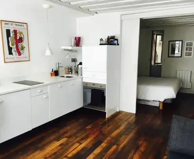 Cuisine ou kitchenette dans l'établissement Chez Vous ST HONORÉ