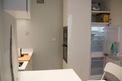 Cuisine ou kitchenette dans l'établissement Residence sur Cour