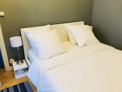 Un ou plusieurs lits dans un hébergement de l'établissement Residence sur Cour
