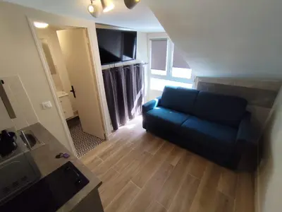 Coin salon dans l'établissement Rent a Room - Cosy studio
