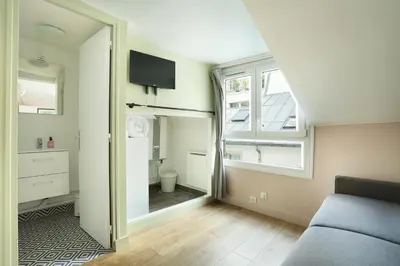 Télévision ou salle de divertissement dans l'établissement Rent a Room - Cosy studio