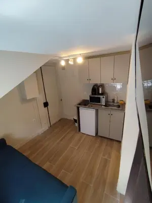 Cuisine ou kitchenette dans l'établissement Rent a Room - Cosy studio