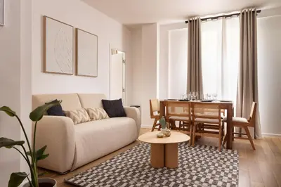 Coin salon dans l'établissement Modern apartment 2BR-6P - Jardin de Luxembourg