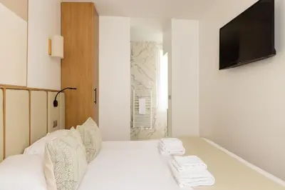 Un ou plusieurs lits dans un hébergement de l'établissement Modern apartment 2BR-6P - Jardin de Luxembourg