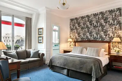 Un ou plusieurs lits dans un hébergement de l'établissement Hôtel San Régis