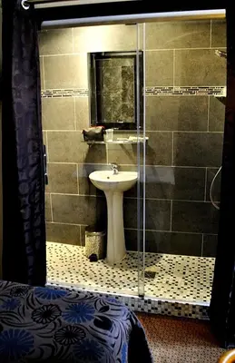 Salle de bains dans l'établissement Hôtel des Buttes Chaumont