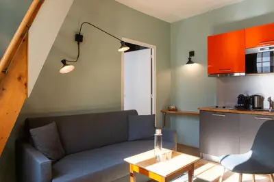 Cuisine ou kitchenette dans l'établissement Hôtel Helzear Montparnasse by Esteem