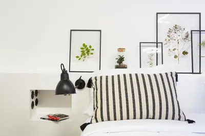 Un ou plusieurs lits dans un hébergement de l'établissement Habitat Parisien - 2BR-2BA - Aircon Loft Montorgueil