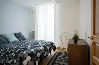 Un ou plusieurs lits dans un hébergement de l'établissement Rue du Temple - Le Marais with AC