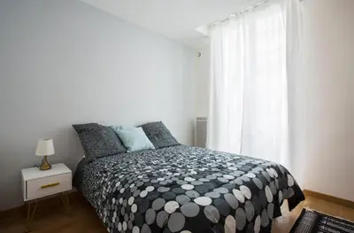Un ou plusieurs lits dans un hébergement de l'établissement Rue du Temple - Le Marais with AC