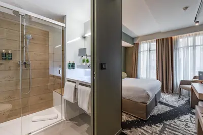 Salle de bains dans l'établissement Hôtel B55