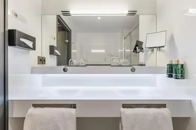 Salle de bains dans l'établissement Hôtel B55