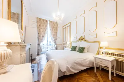Un ou plusieurs lits dans un hébergement de l'établissement Maison de Lignières - Guest House - Paris quartier Champs-Elysées