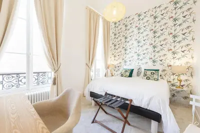 Un ou plusieurs lits dans un hébergement de l'établissement Maison de Lignières - Guest House - Paris quartier Champs-Elysées