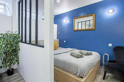 Un ou plusieurs lits dans un hébergement de l'établissement Elegant and cosy 2/3 rooms - Heart of Paris