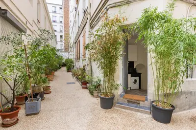 Jardin de l'établissement Elegant and cosy 2/3 rooms - Heart of Paris