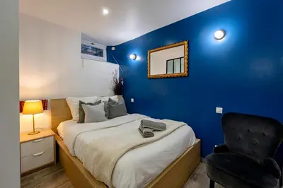 Un ou plusieurs lits dans un hébergement de l'établissement Elegant and cosy 2/3 rooms - Heart of Paris