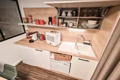 Cuisine ou kitchenette dans l'établissement Les cles du 27 Paris