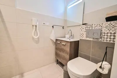 Salle de bains dans l'établissement Les cles du 27 Paris