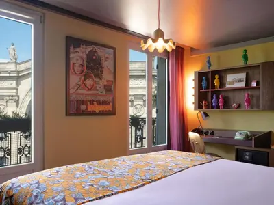 Un ou plusieurs lits dans un hébergement de l'établissement 25hours Hotel Terminus Nord