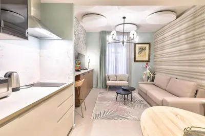 Cuisine ou kitchenette dans l'établissement Hotel 33 Marbeuf