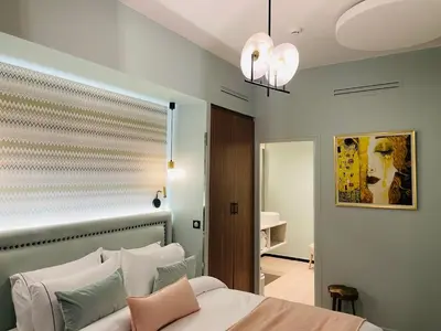 Un ou plusieurs lits dans un hébergement de l'établissement Hotel 33 Marbeuf