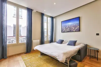 Un ou plusieurs lits dans un hébergement de l'établissement 71 - Amazing Apartment in Le Marais