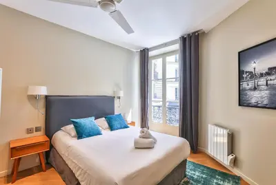 Un ou plusieurs lits dans un hébergement de l'établissement 71 - Amazing Apartment in Le Marais
