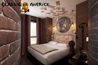 Un ou plusieurs lits dans un hébergement de l'établissement Hôtel Vice Versa