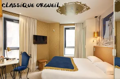 Un ou plusieurs lits dans un hébergement de l'établissement Hôtel Vice Versa