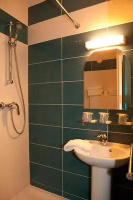 Salle de bains dans l'établissement Royal Wagram